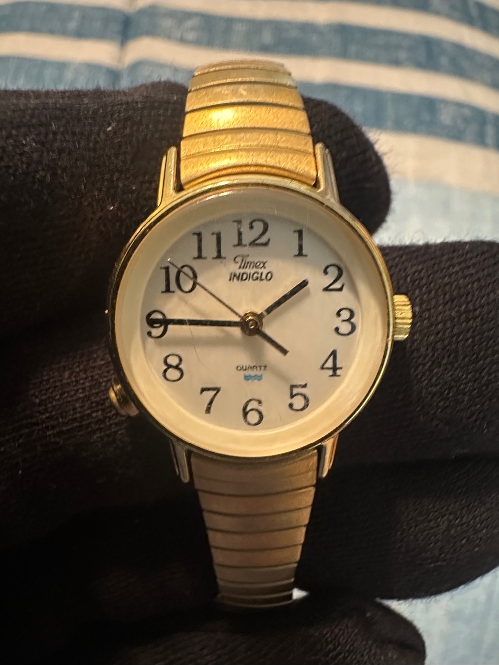 Vintage Timex Indiglo Gold Tone Women's Watch with White Dial